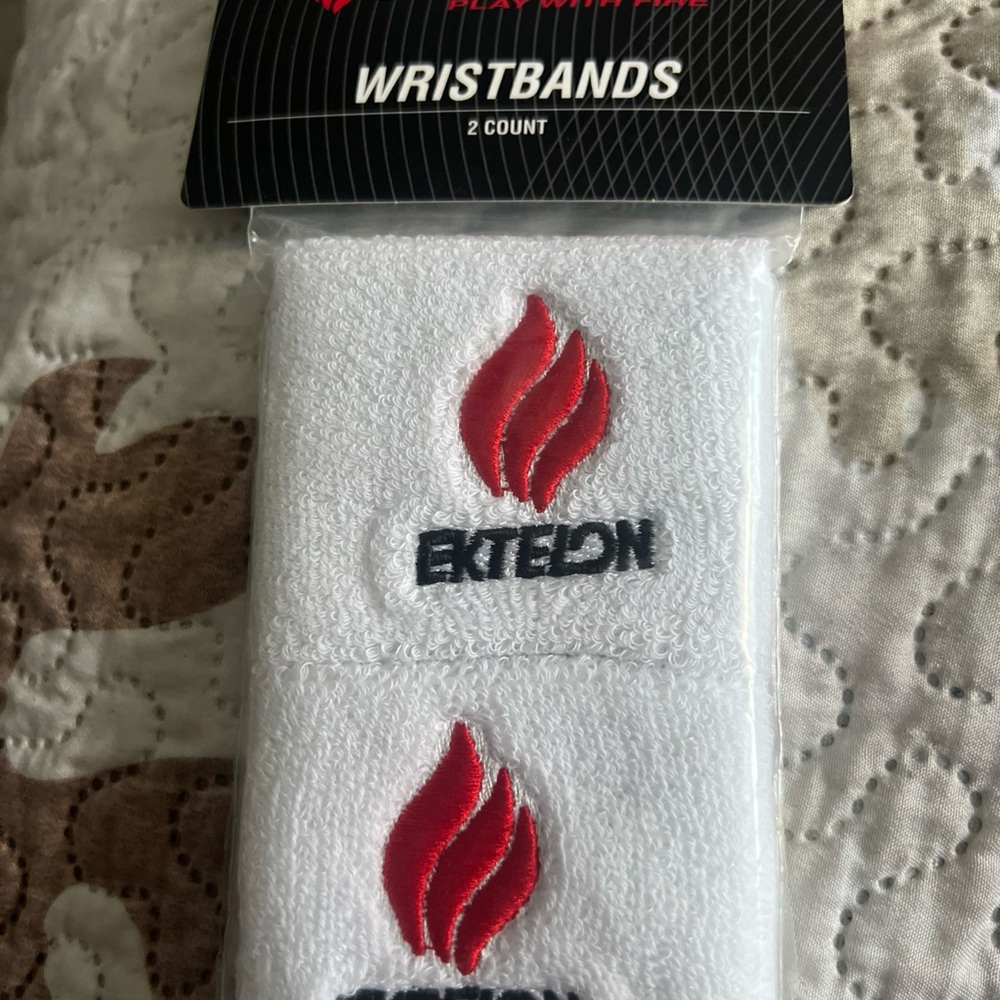 White Wristbands with Red Flame Logo